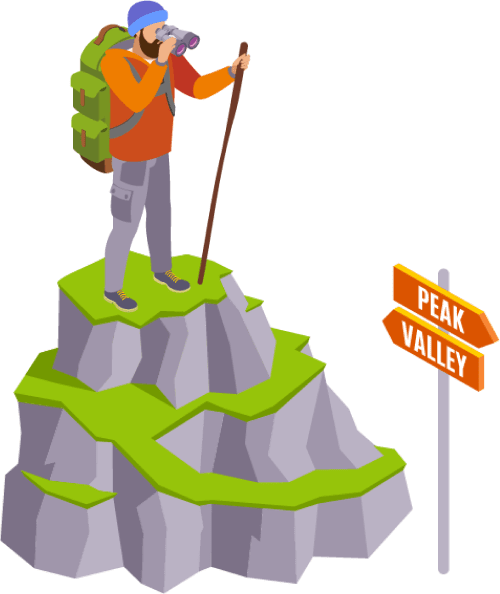 Person looking from the top of a mountain